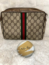 Gucci Supreme Clutch
