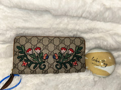 Gucci Supreme Floral Zippy Wallet