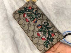 Gucci Supreme Floral Zippy Wallet