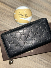 Gucci Guccisima Black Leather Zippy Wallet
