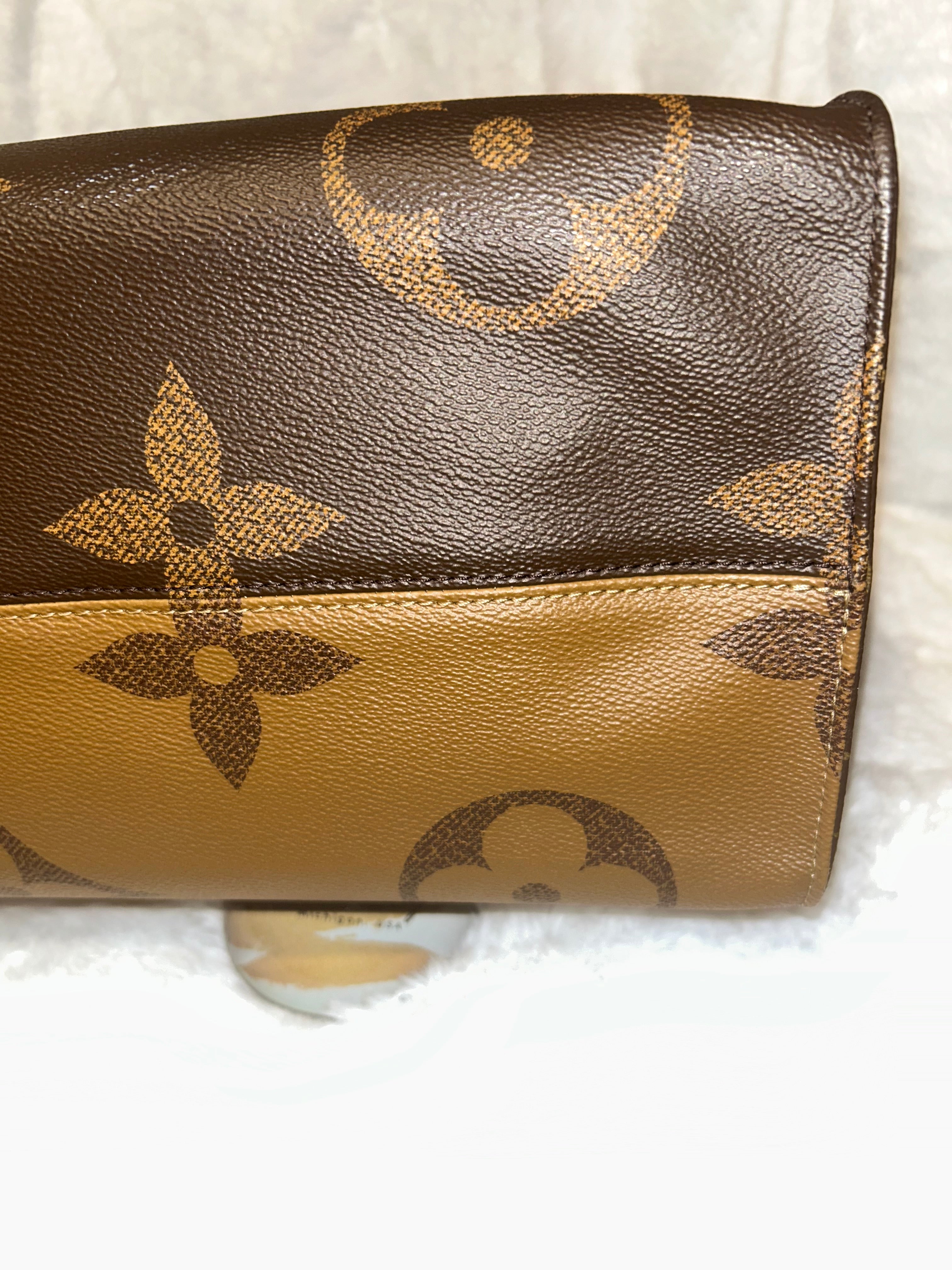LV Reverse Monogram On The Go GM