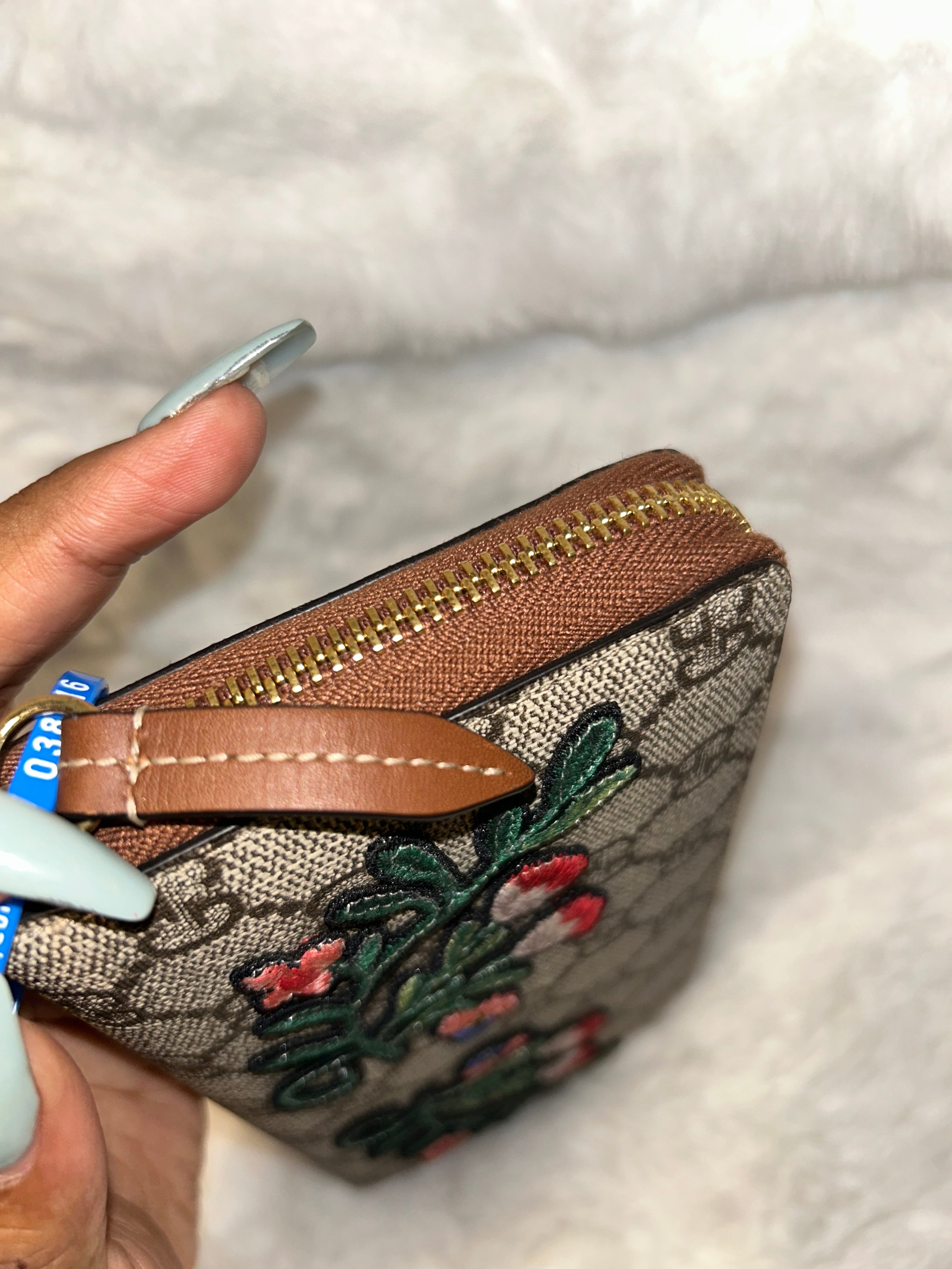 Gucci Supreme Floral Zippy Wallet