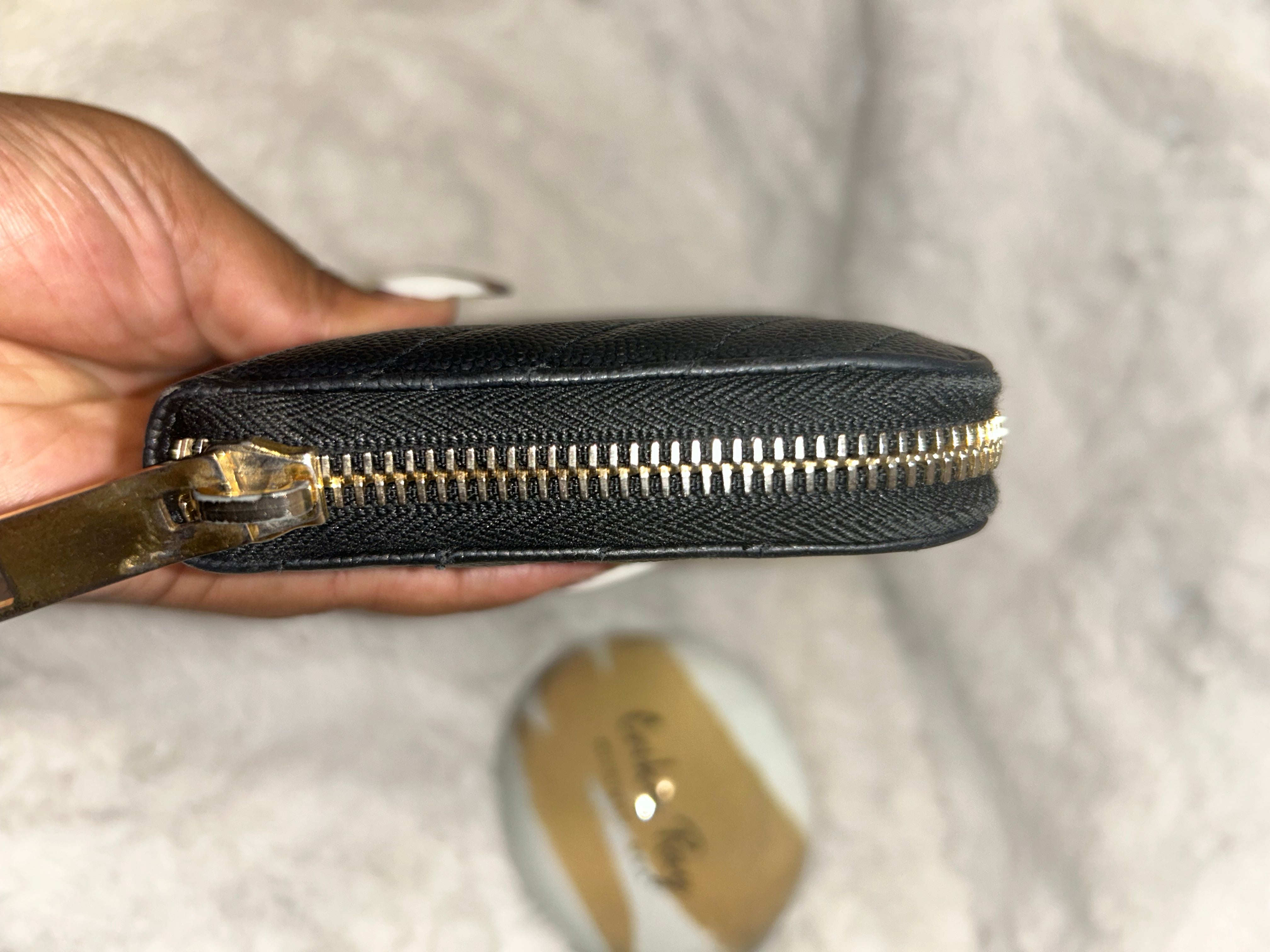 YSL Black Zippy Wallet